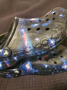 CROCS Galaxy Print Clog Mules in Black and Blue with Pink Accents